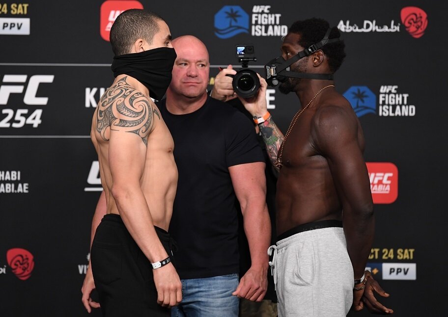 Robert Whittaker and Jared Cannonier stare off
