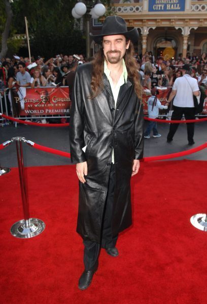 Chris 'jesus' Ferguson wearing long leather trench coat on red carpet