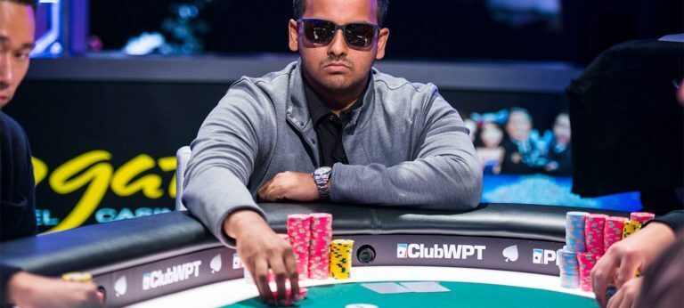 taha maruf playing poker with sunglasses at world poker tour