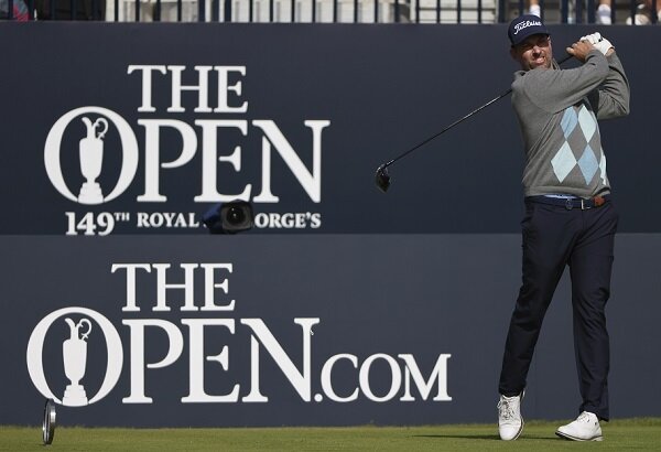 Webb Simpson hits a drive at the Open Championship
