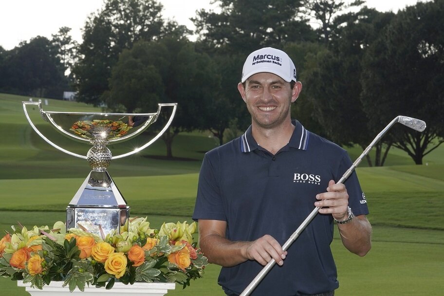 Patrick Cantlay poses with the FedEx Cup